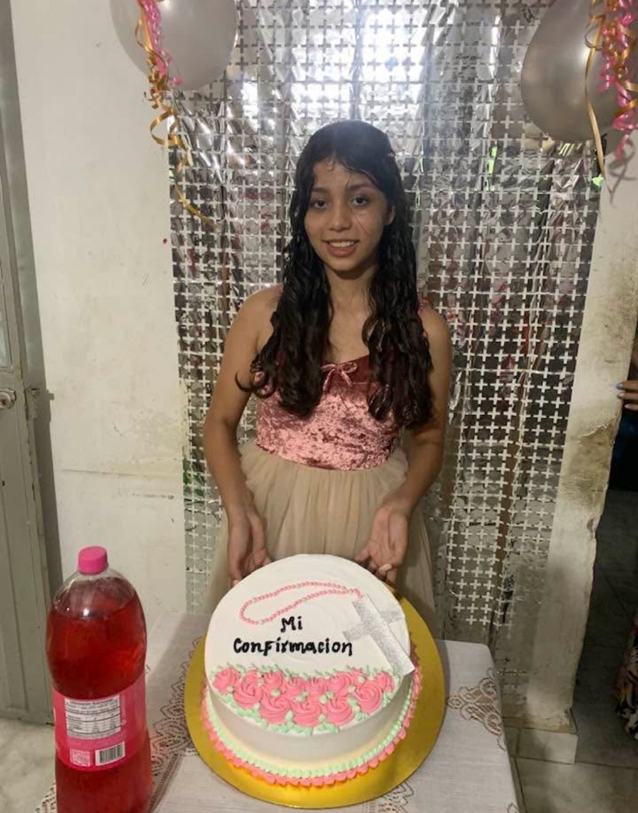 Daughter holding Mi Confirmacion cake